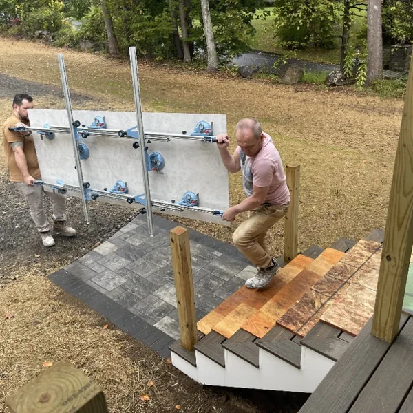 Cross Tiles team installing a gauged porcelain panel, Connecticut